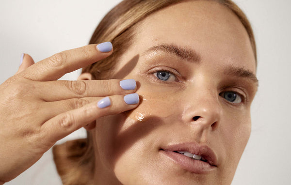 Women putting Pipette Brightening Mask