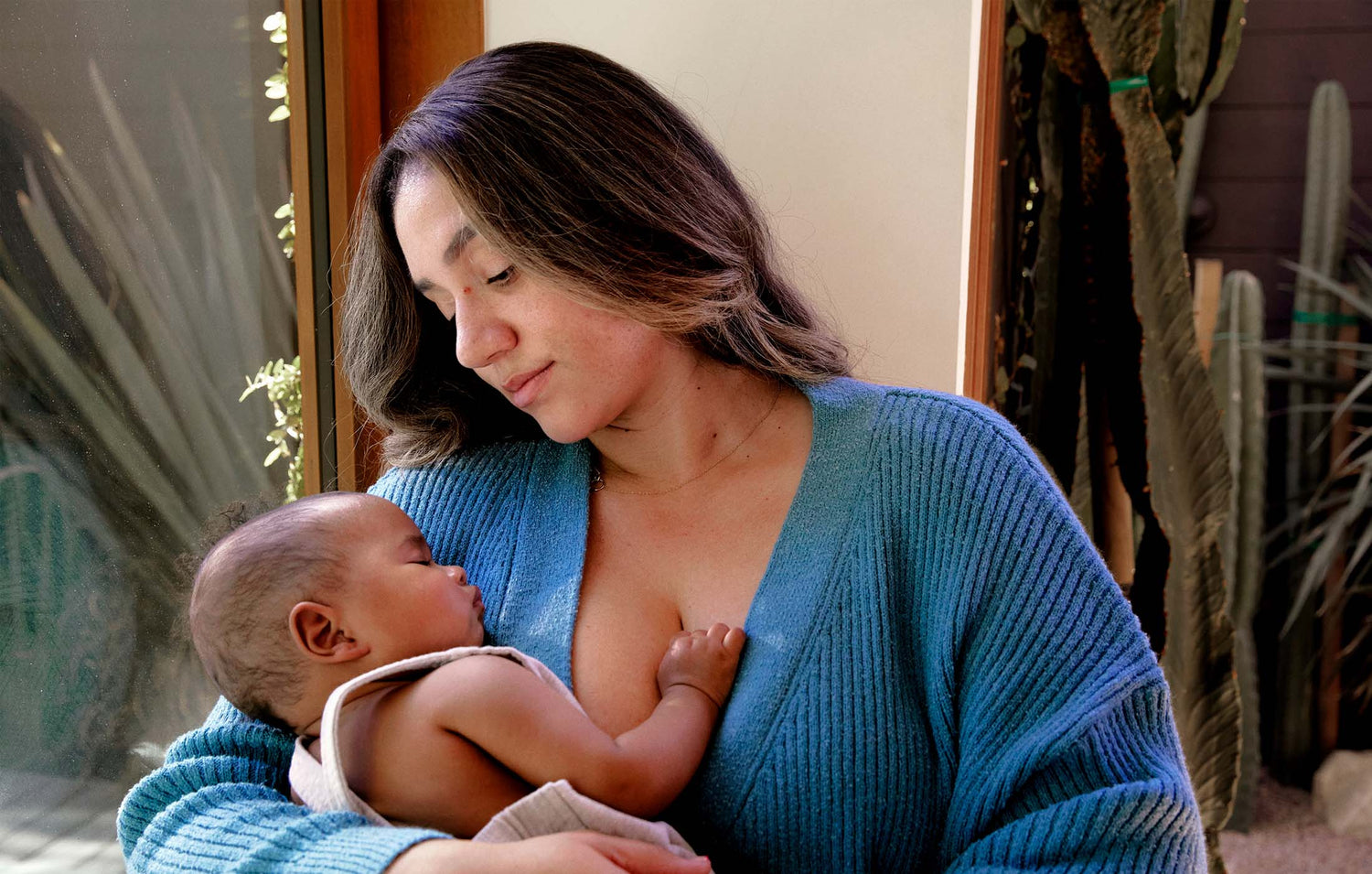 Mom holding baby.