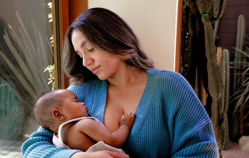 Mom holding baby.
