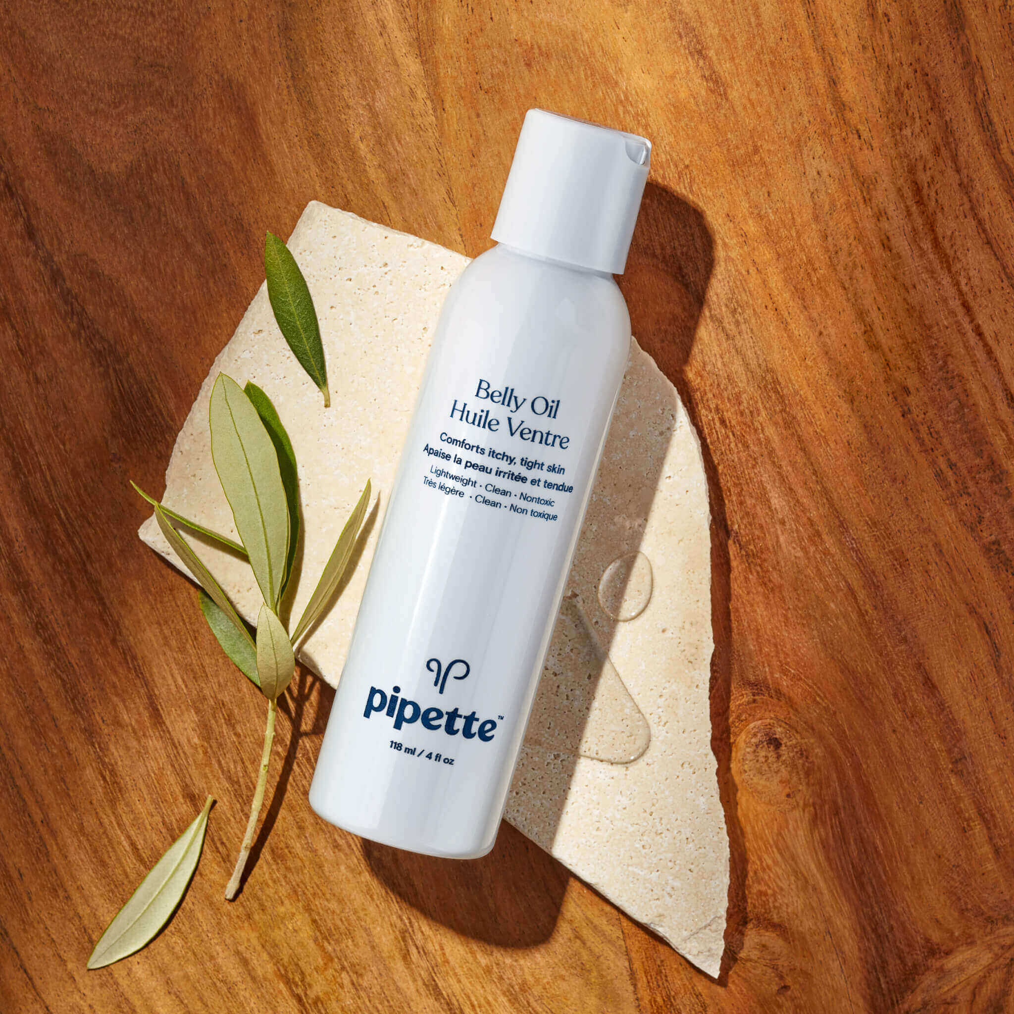 non-toxic belly oil with vegan ceramides that cleanses and comforts itchy and tight skin