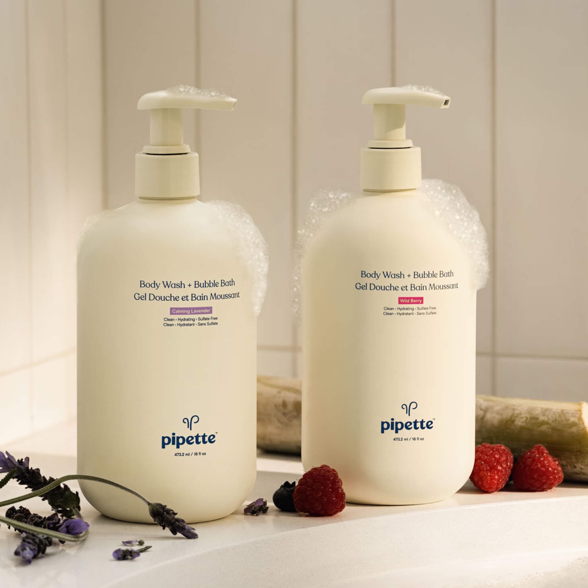 bottles of body wash and bubble bath available in two plant derived aromas, calming lavender and wild berry