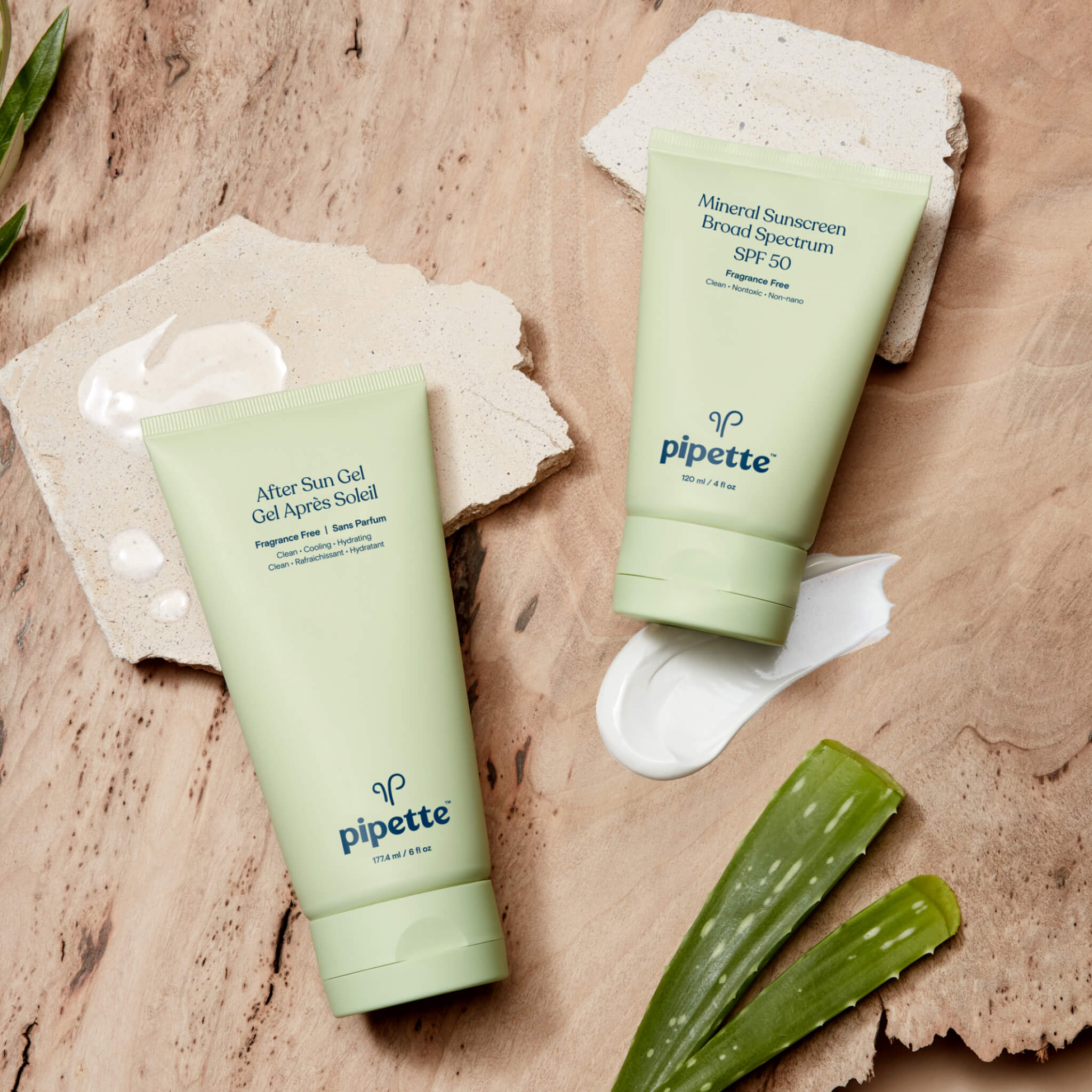 sun protection products laying down and a texture smear by each side
