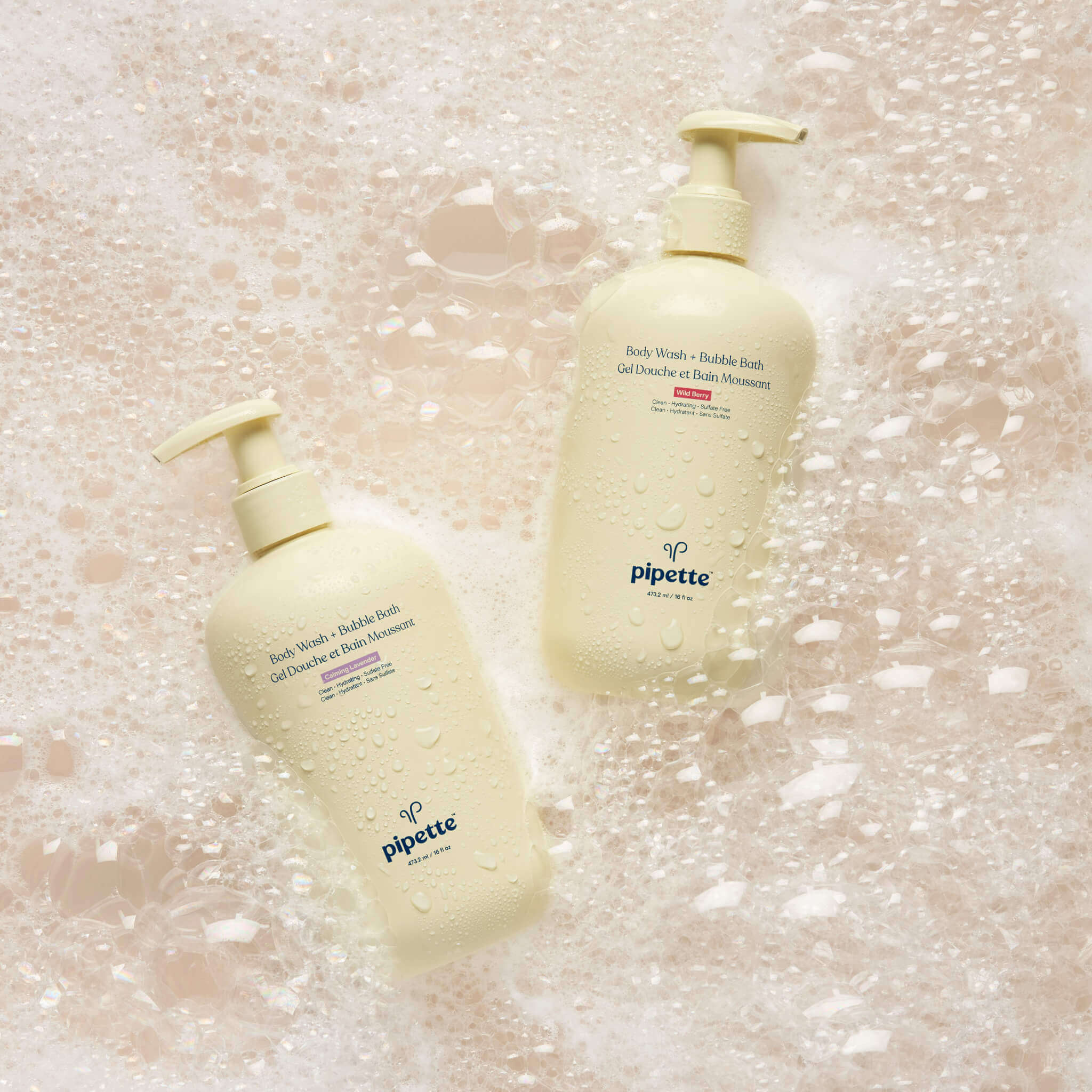 bottles of bubble bath duo with a lot of bubbles around